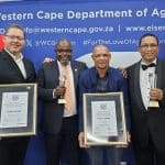 Pieter van Zyl, general manager of procurement at Shoprite Freshmark, Dr Mogale Sebopetsa, head of the Western Cape Department of Agriculture, Vivian Jakobs, Prestige Agri-Worker for 2023 and Dr Ivan Meyer, Western Cape minister of agriculture.