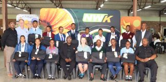 NWK donates laptops to top students